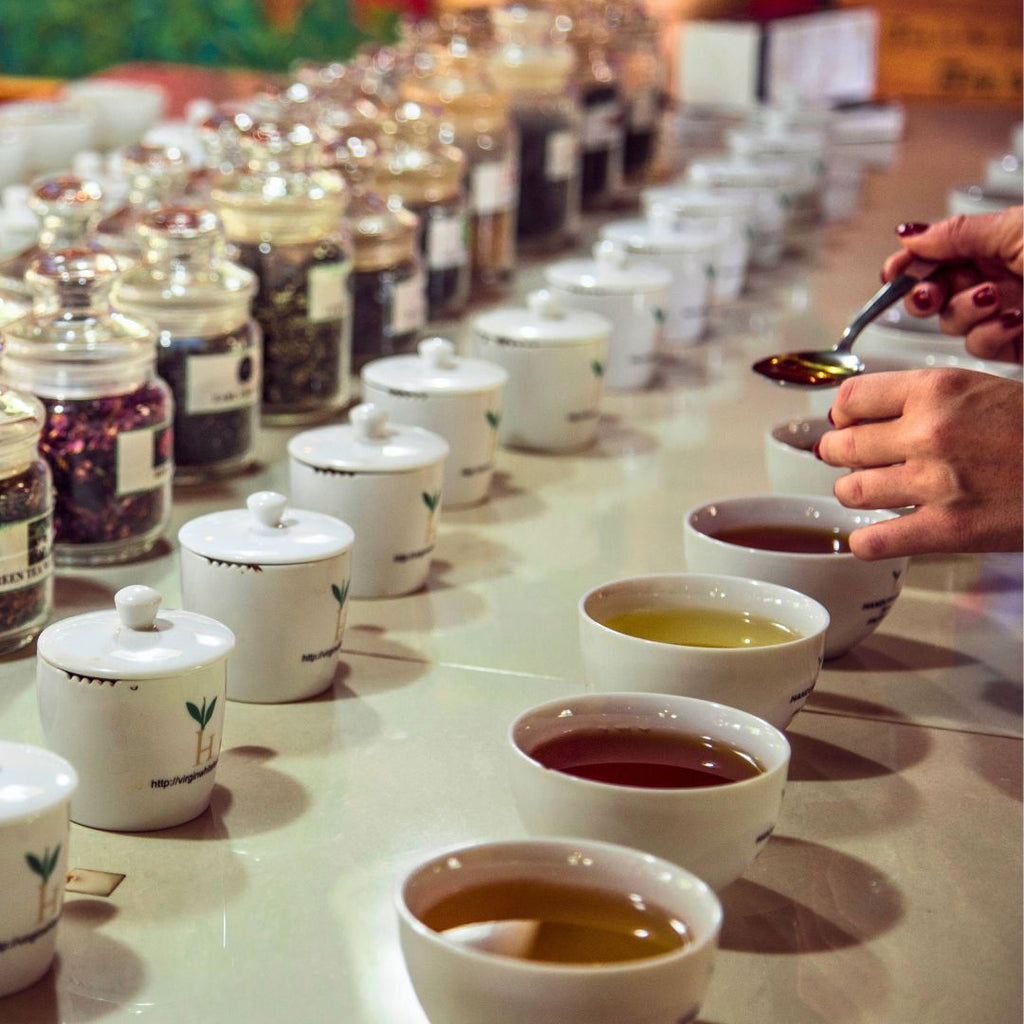 Assorted tea cups with herbal blends showcasing top tea trends in 2025